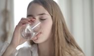 To ensure proper hydration, it is important to consume a sufficient amount of water before, during, and after exercise. (Andrea Piacquadio/ Pexels)